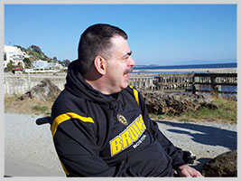 Man looking out to the shoreline